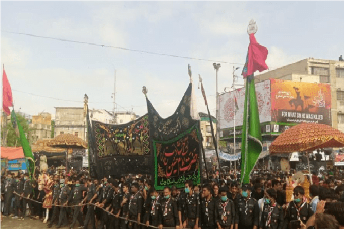 Mourners paying tribute during Ashura procession